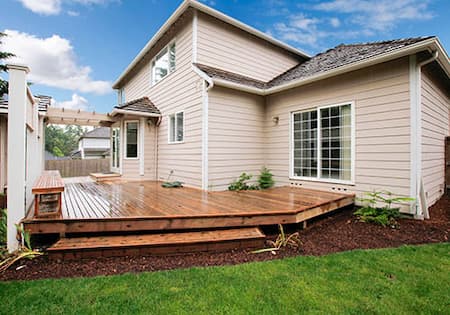 Deck Painting vs. Staining: Which Is Better For Your Outdoor Space?