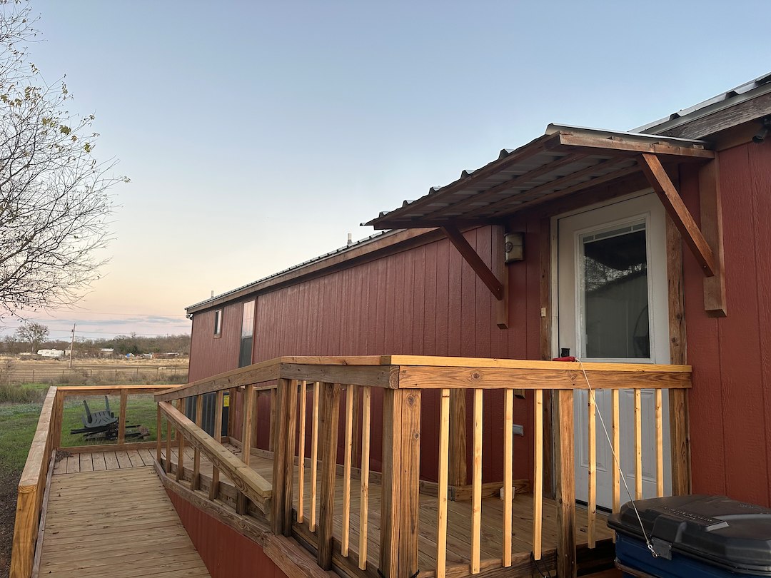 Taking back what the Texas weather took from this beautiful cabin patio ramp in Salado, TX